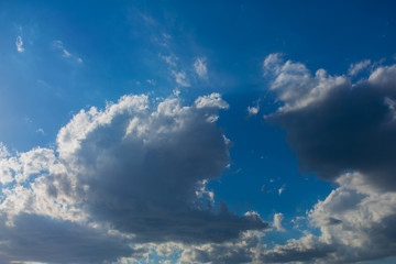 Blue sky with clouds. Blue sky with nimbostratus clouds. Blue sky with clouds background.