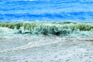 waves crashing on beach