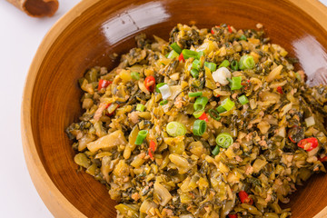 A dish of spicy Hunan cuisine in white background