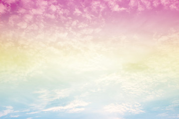 A soft fog cloud background with pastel colored orange to blue gradient