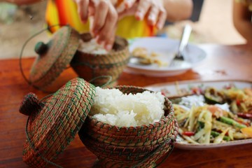  Glutinous rice put in a cup made of papyrus on the table