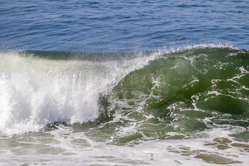 empty wave crashing in the ocean 
