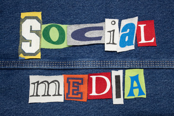 SOCIAL MEDIA word collage on denim with tee shirt lettering cut out, personal marketing, horizontal aspect