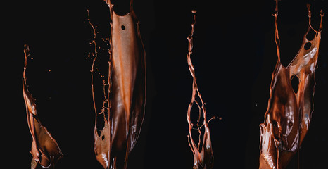 Hot chocolate splash collection, cocoa splash texture on a black background. High-speed food...