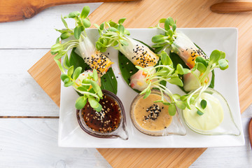 Rice paper salad rolls with carrot,sunflower sprout, corn and crab stick
