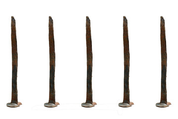 old, rusty, forged nail on a white background. insulated nail 