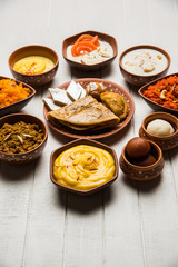 group of Indian Sweet / mithai in terracotta bowl