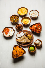 group of Indian Sweet / mithai in terracotta bowl