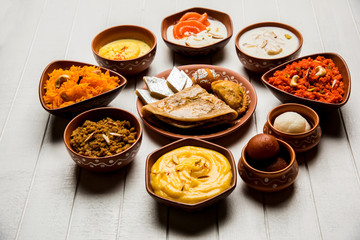 group of Indian Sweet / mithai in terracotta bowl