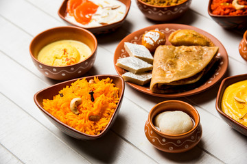 group of Indian Sweet / mithai in terracotta bowl