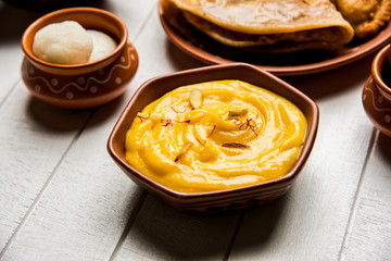 group of Indian Sweet / mithai in terracotta bowl