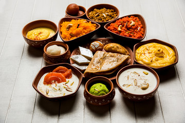group of Indian Sweet / mithai in terracotta bowl