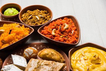 group of Indian Sweet / mithai in terracotta bowl
