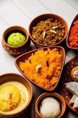 group of Indian Sweet / mithai in terracotta bowl
