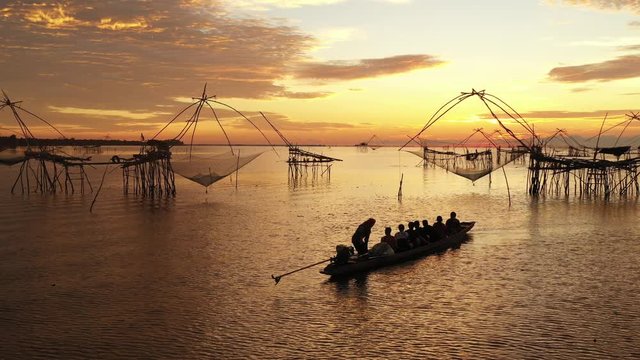 View sunrise at Sri Pak Pra fishing traditional local fishing trap with silhouette
