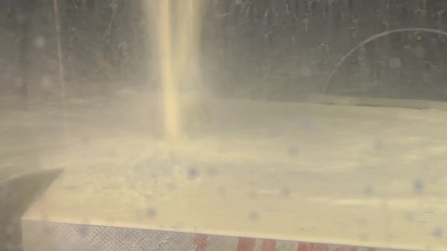 Finishing metal working on high precision grinding machine in workshop.  industrial metal machining cutting process of blank detail by milling cutter with hardmetal carbide insert