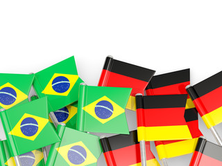 Pins with flags of Brazil and germany isolated on white.