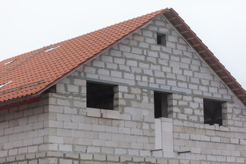 Roof in a brick house under construction