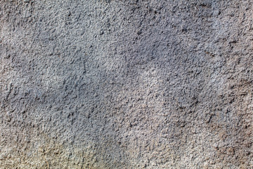 Cracked plaster wall as abstract background