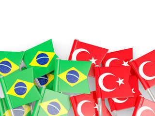 Pins with flags of Brazil and turkey isolated on white.