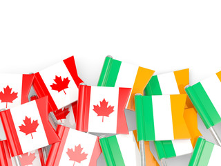 Fototapeta na wymiar Pins with flags of Canada and ireland isolated on white.