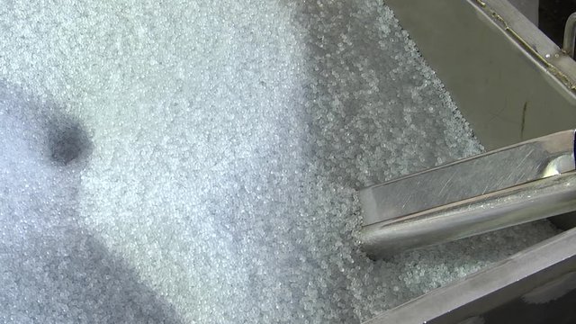 Polyvinyl chloride granules for the production of hoses. Production of silicone hoses. Industrial Blender For Polymers Closeup