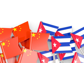 Fototapeta na wymiar Pins with flags of China and cuba isolated on white.