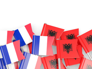 Obraz premium Pins with flags of France and albania isolated on white.