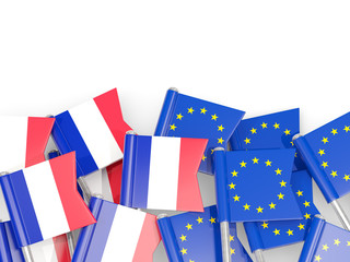 Fototapeta na wymiar Pins with flags of France and EU isolated on white.