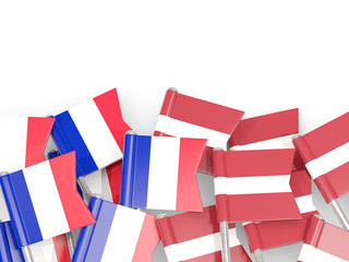 Fototapeta na wymiar Pins with flags of France and latvia isolated on white.