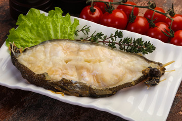 Baked wolffish steak
