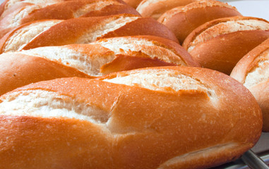 Baguettes just pulled out of the oven, a traditional European snack.