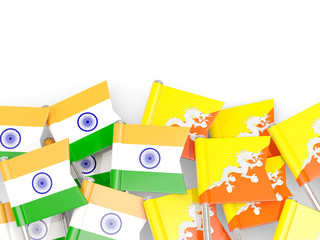 Pins with flags of India and bhutan isolated on white.