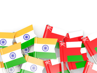 Pins with flags of India and oman isolated on white.
