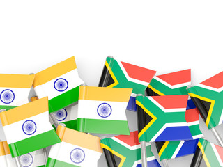 Pins with flags of India and south africa isolated on white.