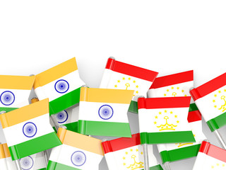 Pins with flags of India and tajikistan isolated on white.