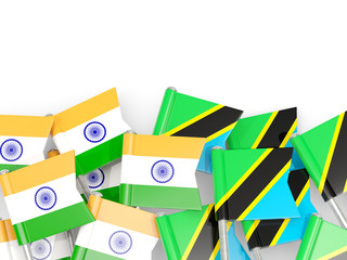 Pins with flags of India and tanzania isolated on white.