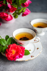 Tea set with red roses