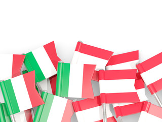 Fototapeta na wymiar Pins with flags of Italy and austria isolated on white.