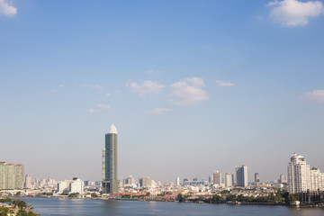 Modern city downtown building of Bangkok skyling with river