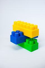 bright details of the children's plastic designer: yellow, blue and green