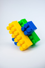 bright details of the children's plastic designer: yellow, blue and green