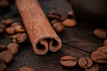 Obraz na płótnie Canvas Coffee grains with cinnamon