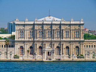 Fototapeta na wymiar Dolmabahce palace exterior gate view from sea. Istanbul, Turkey.