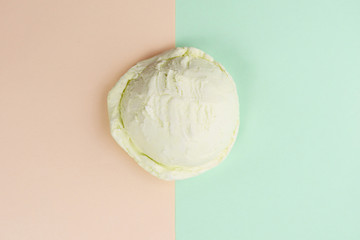 Ice-cream scoop on pastel background, copy space. Summer vacation, refreshment, traditional seasonal cold sweets