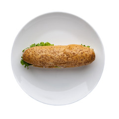 hot dog with lettuce in a plate on a white background, top view