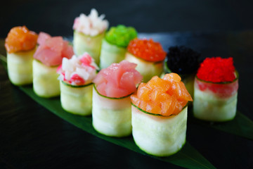 Seafood delicatessen sushi rolls on slate. Different gourmet snacks. Luxury lifestyle, Japanese food art, expensive meals, restaurant menu
