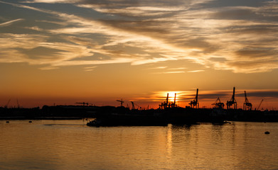 Fototapeta na wymiar Sunset in port of Rotterdam