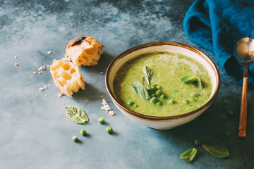 Green pea cream soup with mint. Vegetarian healthy soup