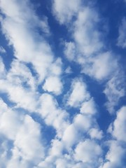 White fluffy clouds in a blue sky